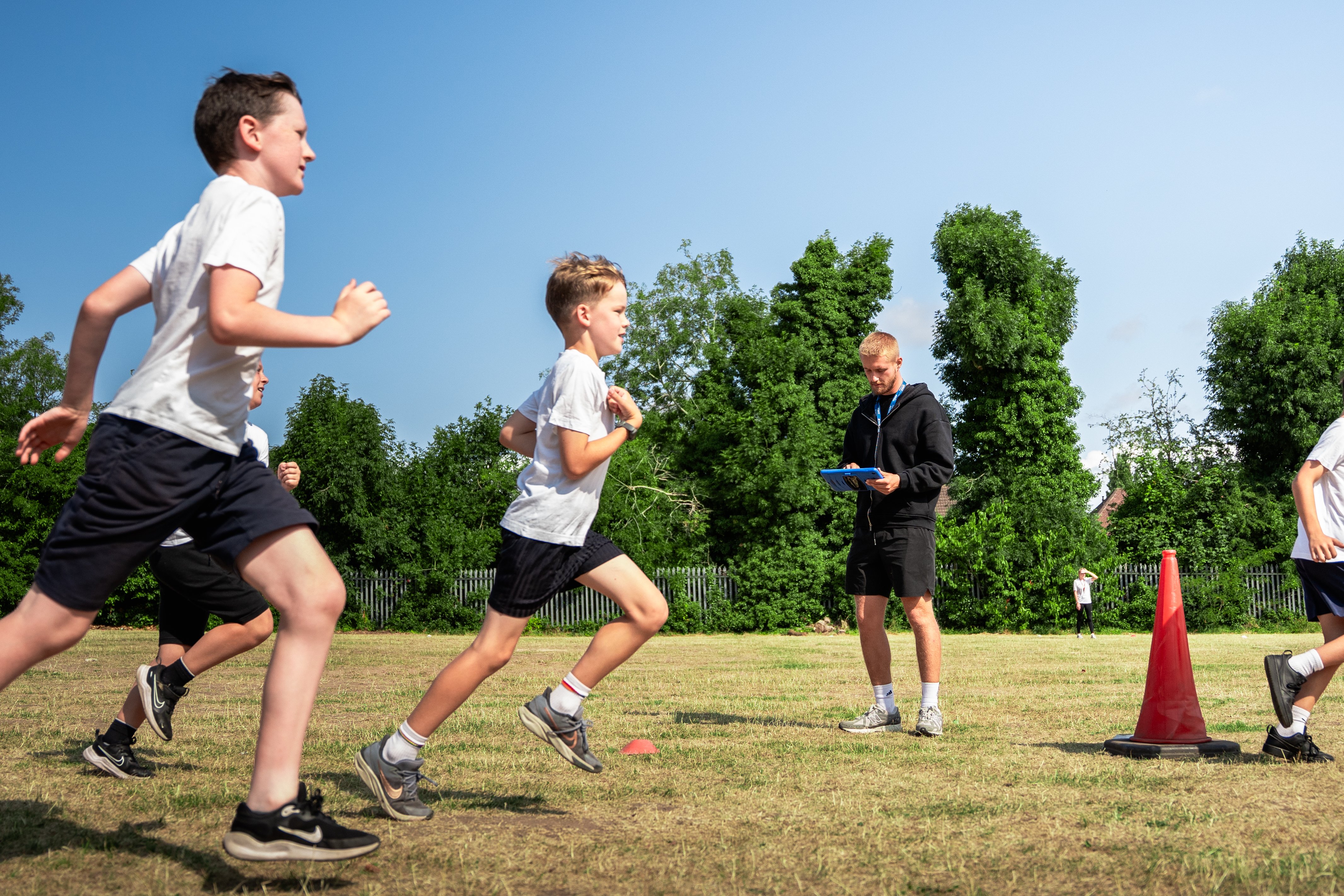 RunEd male teacher and runners - master-1